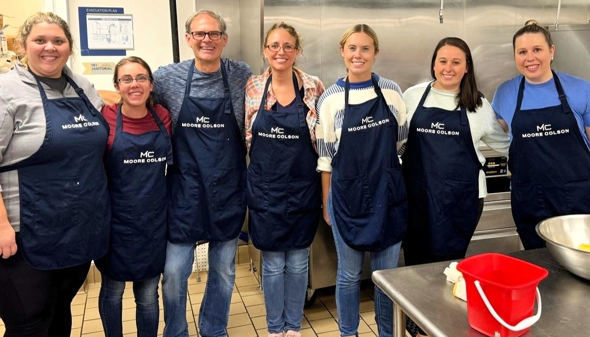 Moore Colson Team volunteering with MUST Ministries