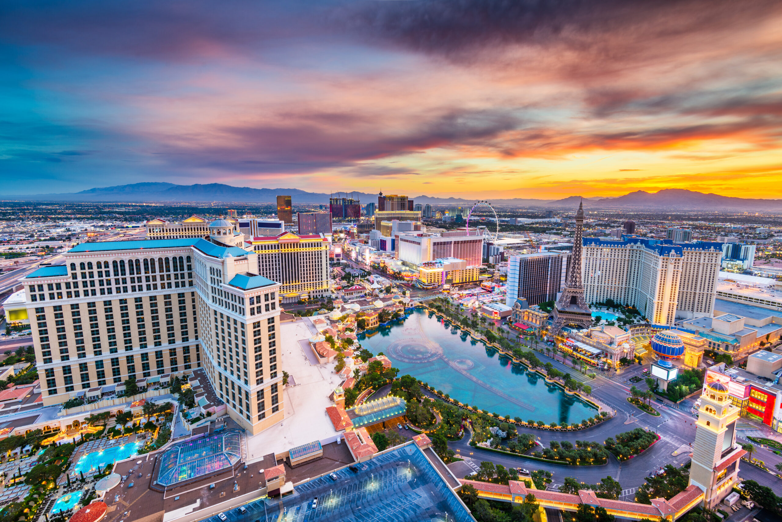 Las Vegas Strip at sunset showing Bellagio fountains, backdrop for Moore Colson's Las Vegas business valuation clients.